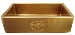 burnished copper farmhouse sink with crab image in repoussé