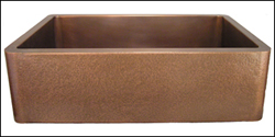 Copper farmhouse sink with a hammered apron front