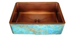 copper double basin farmhouse sink with a custom turquoise verdigris finish