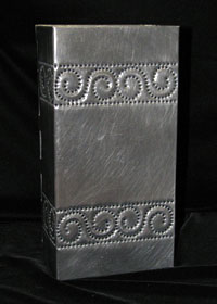 hand punched rectangular wall fixture in burnished pewter